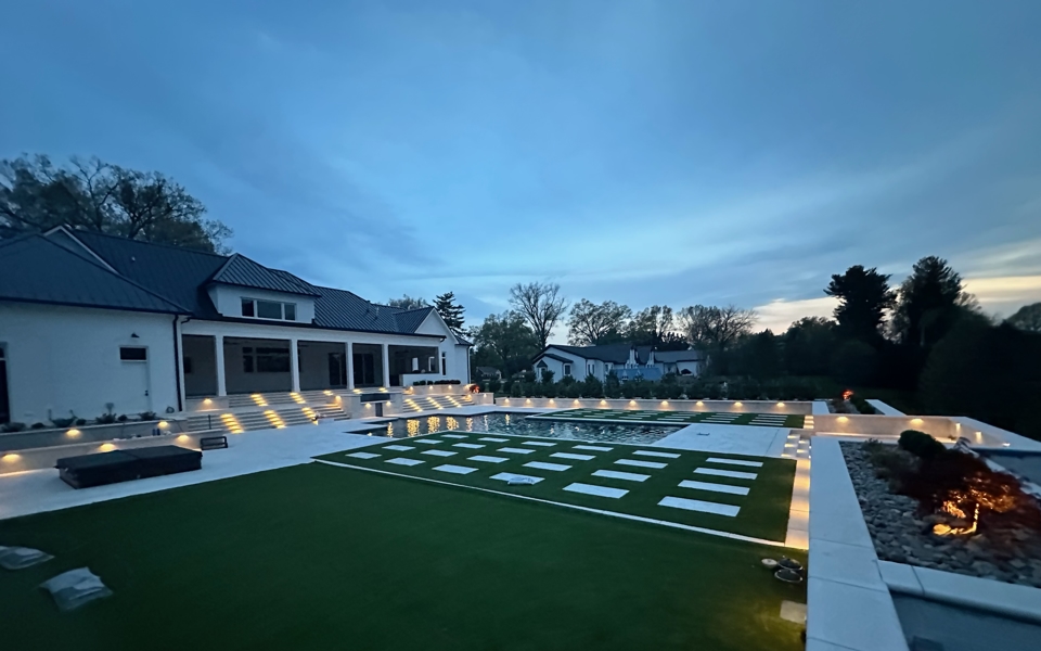night photo with pool and pavers Photo