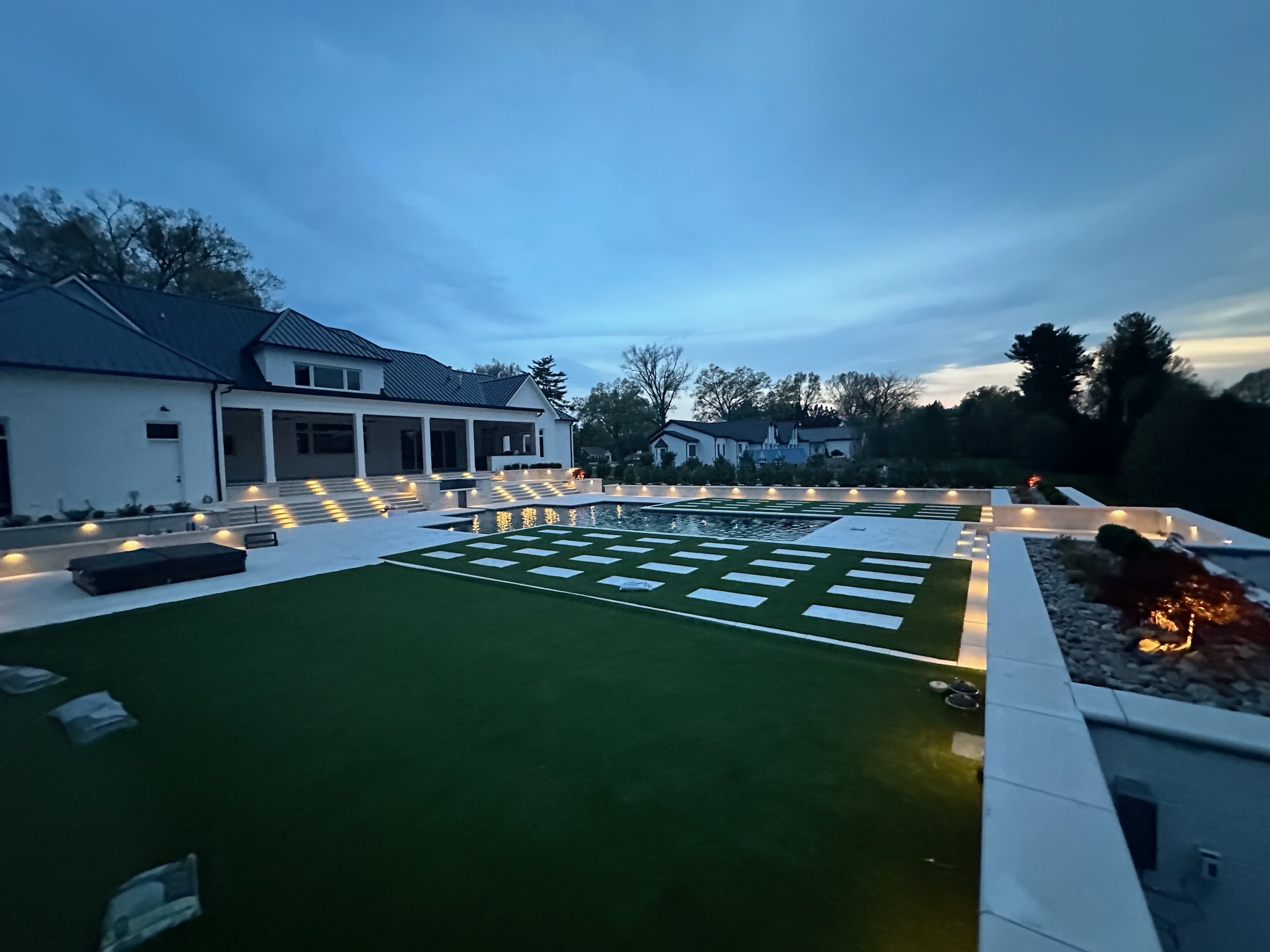 night photo with pool and pavers Photo